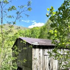 Metal-Roof-Replacement-Transforms-Flag-Pond-TN-Barn-into-Striking-Feature 1